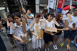 Young protesters at the annual pro-democracy march from Victoria Park, Hennessy Road, Wanchai, 1 July 2017