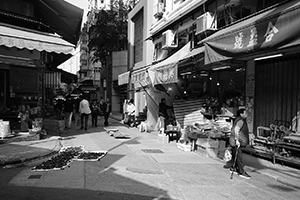 Shops and food airing on the street, Sheung Wan, 1 January 2018