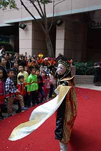 A face-changing ('Bian Lian') performance for Chinese New Year, Queen's Terrace, Queen Street, Sheung Wan, 6 February 2019