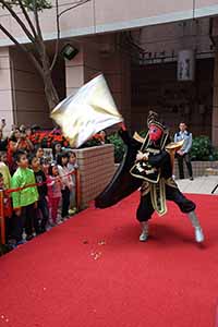 A face-changing ('Bian Lian') performance for Chinese New Year, Queen's Terrace, Queen Street, Sheung Wan, 6 February 2019