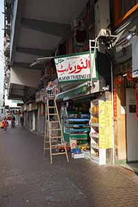 Painting a shop sign, Sham Shui Po, 5 February 2019