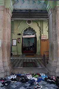 Shoes outside the entrance to Jamia Mosque, Shelley Street, Central, 3 March 2019