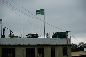 Flag on the roof of a building, Lamma Island, 24 March 2019