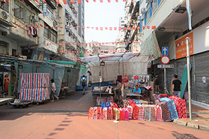 Market stalls and flags, Yau Ma Tei, 11 May 2019