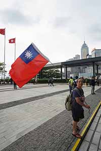 Protester with a Taiwanese flag, in the area outside the Legislative Council entrance, Admiralty, 4 May 2019