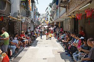 Crowds waiting for a parade during the Cheung Chau Bun Festival, 12 May 2019