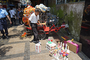 Cheung Chau street scene during the Bun Festival with hawker stall, 12 May 2019