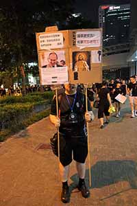 Anti-extradition bill protester with a banner, outside the Legislative Council, Admiralty, 16 June 2019