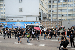 Police vehicle trapped near the Wanchai Police Headquarters, 21 June 2019