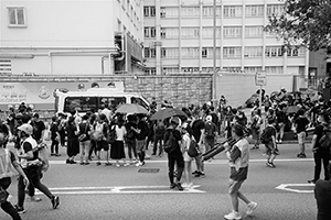 Police vehicle trapped near the Wanchai Police Headquarters, 21 June 2019