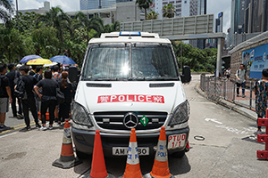 Police vehicle trapped near the Wanchai Police Headquarters, 21 June 2019