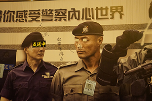 Defaced recruitment poster outside the Wanchai Police Headquarters, Harcourt Road, Wanchai, 21 June 2019