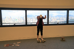 Performance art by a summer school student from Switzerland  in the Run Run Shaw Creative Media Centre, City University of Hong Kong, 29 June 2019