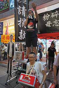 Leung Kwok-hung addressing crowds on their way to the June 4th memorial rally, Great George Street, Causeway Bay, 4 June 2019