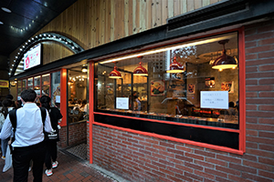 Restaurant with signs showing support for anti-extradition bill protesters, Hennessy Road, Wanchai, 12 June 2019