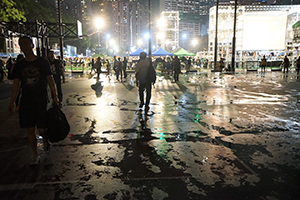 Victoria Park after rain, with crowds gathering for the annual memorial rally, 4 June 2019