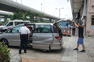 Police on duty near the Central Government Liaison Office, Connaught Road West, Sai Ying Pun, 16 June 2019