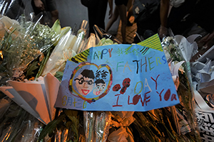 A makeshift shrine for a protester who died in a fall, outside Pacific Place, Admiralty, the site of the accident, 16 June 2019