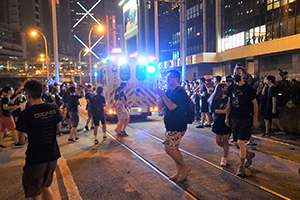 Anti-extradition bill marchers draw aside to allow access for an ambulance, Queensway, Admiralty, 16 June 2019