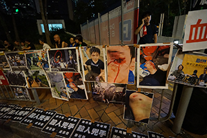 Protest posters alleging police brutality, Rodney Street, Admiralty, 16 June 2019