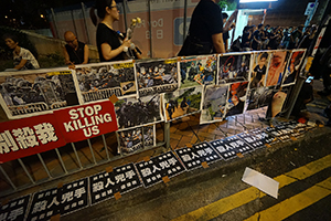 Posters accusing police of  brutality, Rodney Street, Admiralty, 16 June 2019