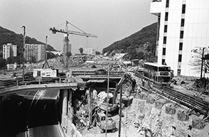 Roadworks at the top of Sassoon Road, from a bridge over Pokfulam Road, 24 October 2001