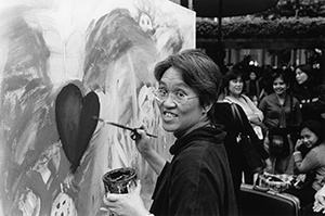 Evelyna Liang at an anti-war carnival, Chater Garden, Central, 8 December 2001