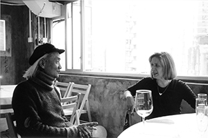 Lau Kin-Wai in conversation with a friend, Yellow Door restaurant, Central, 23 December 2001