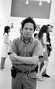 Photographer Frederick Fung at the opening party of the Agnes B Librairie Galerie, Elgin Street, Central, 7 May 2002
