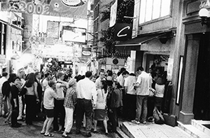 Crowds outside 'Club C' in D'Aguilar Street watching the World Cup, Central,  31 May 2002