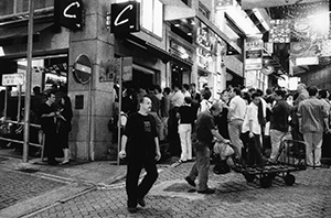 Crowds outside 'Club C' watching the first match of the soccer World Cup, D'Aguilar Street, Central,  31 May 2002