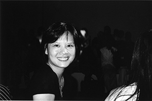 Dancer Mui Cheuk-yin, in the audience for the Agnès B. Fall/Winter 2002 Fashion Show, Tsim Sha Tsui, 6 May 2002