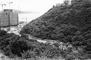 Cyberport under construction with view of a village nearby, 15 June 2002