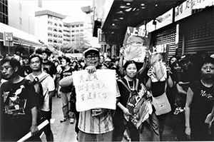 Pro-democracy march from Causeway Bay to Central, 1 July 2003