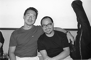 Artist Josh Hon (left), on a return visit to Hong Kong, with actor Lee Chun-chow (right), Club 64, Wing Wah Lane, 13 October 2003
