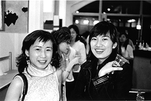 Guests at the opening of Suzy Cheung's ceramics show at Living Art Plus, Wellington Street, 7 May 2004