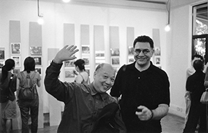 Patrick Lee (left) and Evangelo Costadimas (right) at the Dislocation relaunch party, Hong Kong Island, 26 June 2004