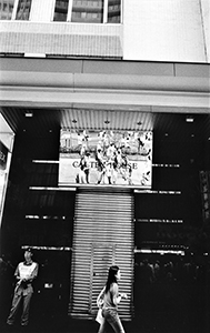 Caltex House, with reflections of the pro-democracy march from Victoria Park to Central, Hennessy Road, Wanchai, 1 July 2004