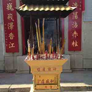 Incense burning in front of a temple, Stanley, 6 October 2013