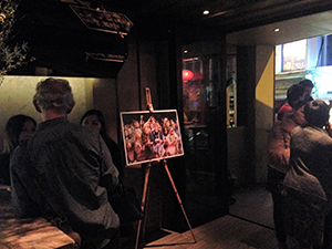 Photograph by David Clarke on display at wine bar Flutes during an event concerning his collaboration with writer Xu Xi, Elgin Street, 27 January 2014