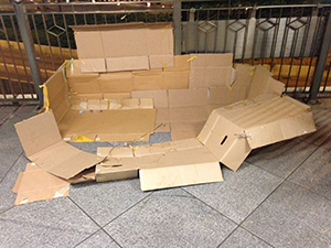 Cardboard boxes on a footbridge in Central, Hong Kong Island, 9 March 2014