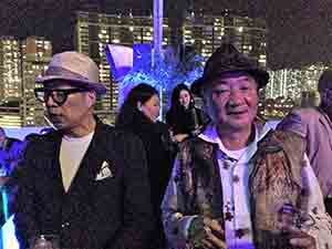 Artist Bing Lee and writer Lau Kin Wai at a concert on the roof of an industrial building in Wong Chuk Hang, 15 March 2015