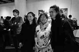 Guests at the opening of an exhibition of Leong Ka Tai's photographs at the City Hall, Central, 11 November 2016