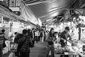 Shoppers and stalls in the Yau Ma Tei Fruit Market, Kowloon, 27 November 2016