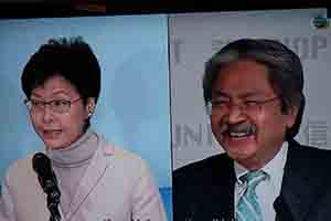 Carrie Lam and John Tsang: TV screen images of Hong Kong Chief Executive election candidates, 20 January 2017