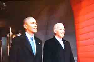 Obama and Biden take their places at Donald Trump's inauguration, as seen on TV, 21 January 2017