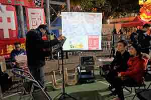 Cartoonist Zunzi drawing a digital caricature, at the Lunar New year flower market, Victoria Park, 26 January 2017