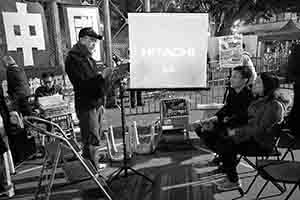 Cartoonist Zunzi drawing a digital caricature, at the Lunar New year flower market, Victoria Park, 26 January 2017