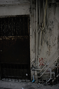 Piping on a wall, Sham Shui Po, 28 January 2017