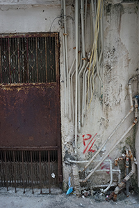Piping on a wall, Sham Shui Po, 28 January 2017